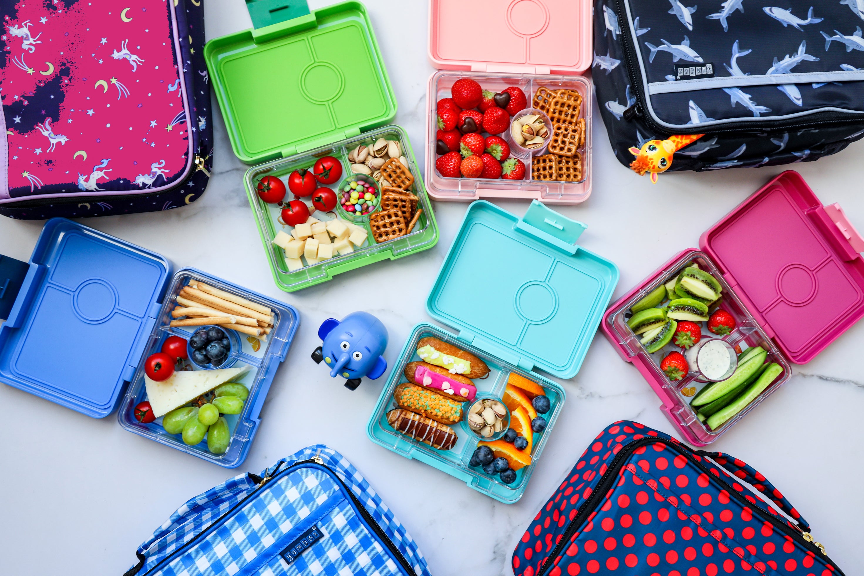 http://yumboxlunch.com/cdn/shop/collections/Snack-2022-Collection-Group-Photo-50per.jpg?v=1657655746