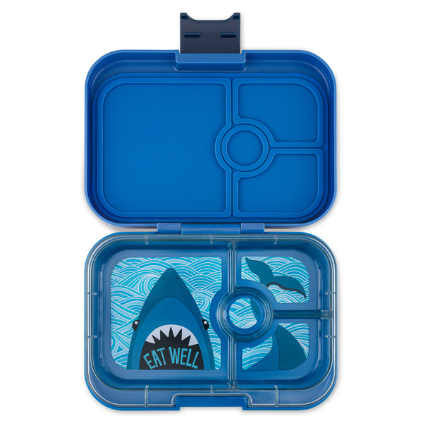Yumbox Panino Blue lunch box with shark design and 'Eat Well' text on a white background
