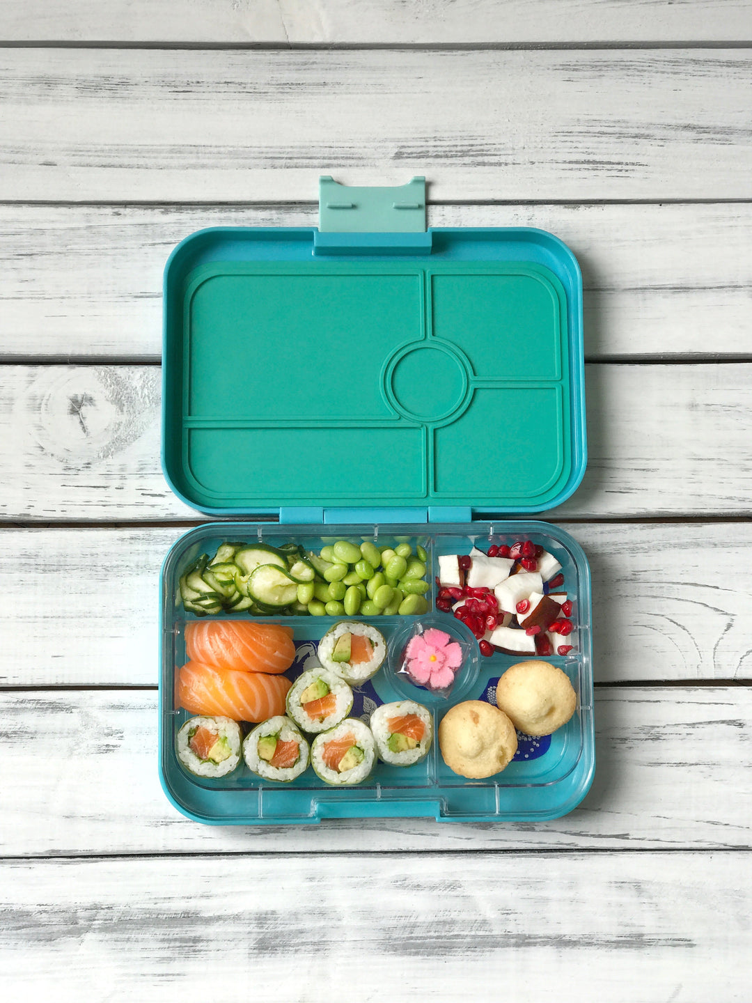Yumbox Tapas bento box is great for teen and adult lunches. You can pack fresh selection of fruit, vegetables and sushi in their own separate tray compartments, without anything mixing together. 